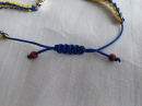 Синьо-жовтий браслет з хрестиком